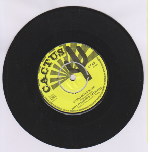 LIVING IN THE SLUM - Well Pleased & Satisfied